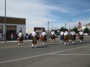 The band continues marching down Central Ave during the East West Shrine Game Parade.